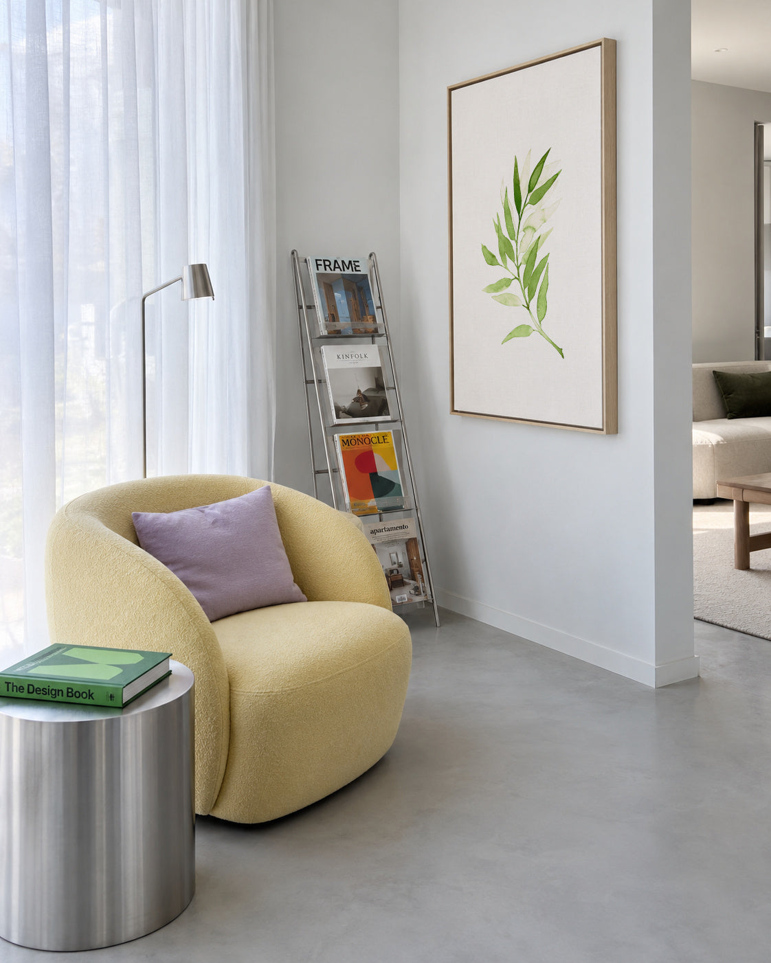 Olive Green Branch - Framed canvas in an interior