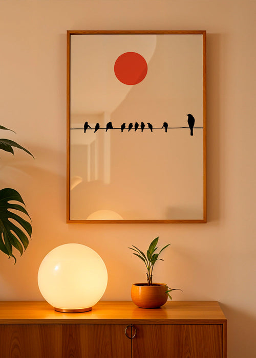 Minimalistisch ontwerp vogels op draad met rode zon