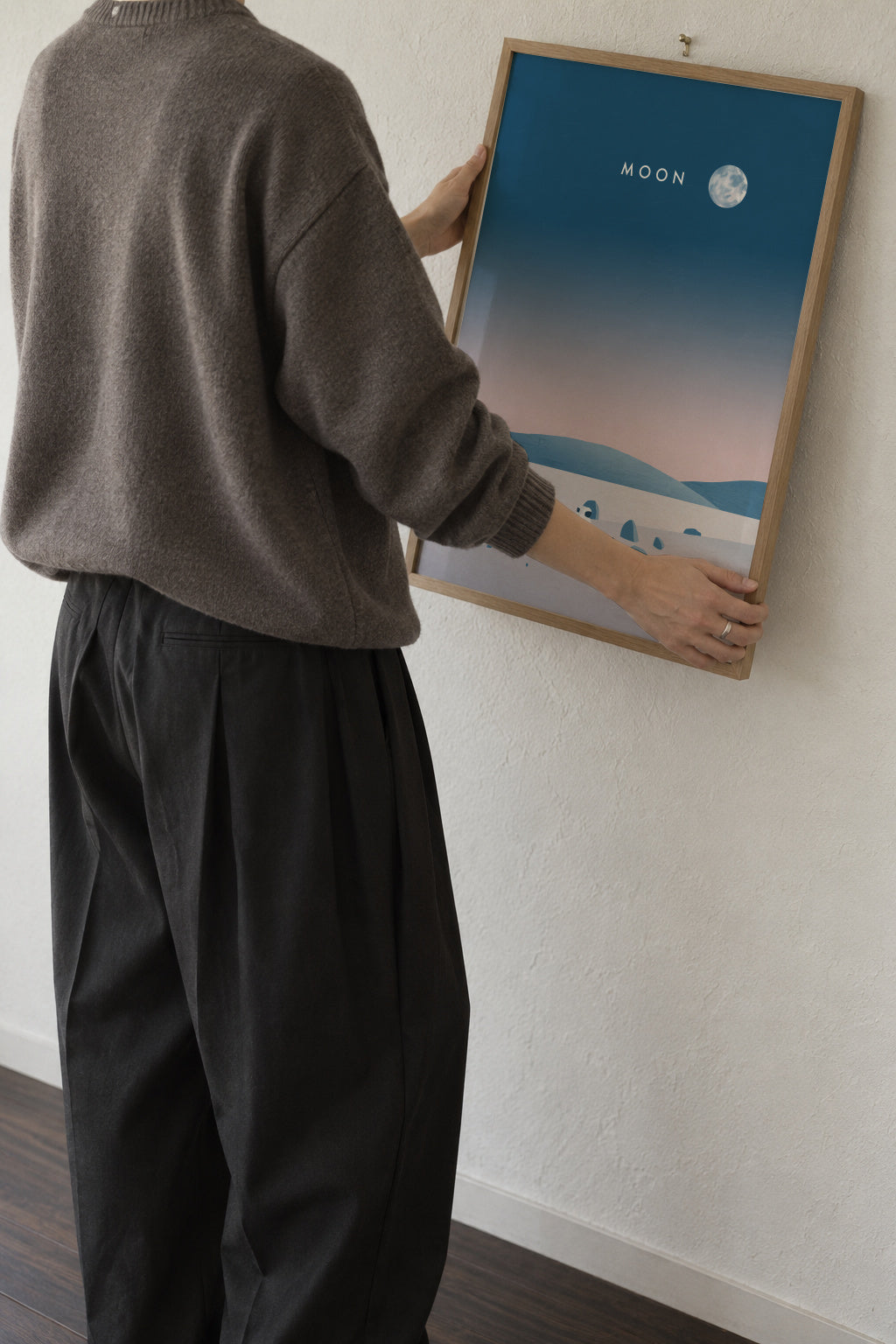 Moon - Framed poster in an interior