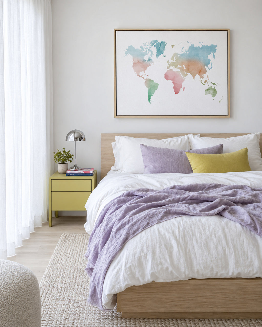 Watercolor World Map - Pastel colors - Framed canvas in an interior