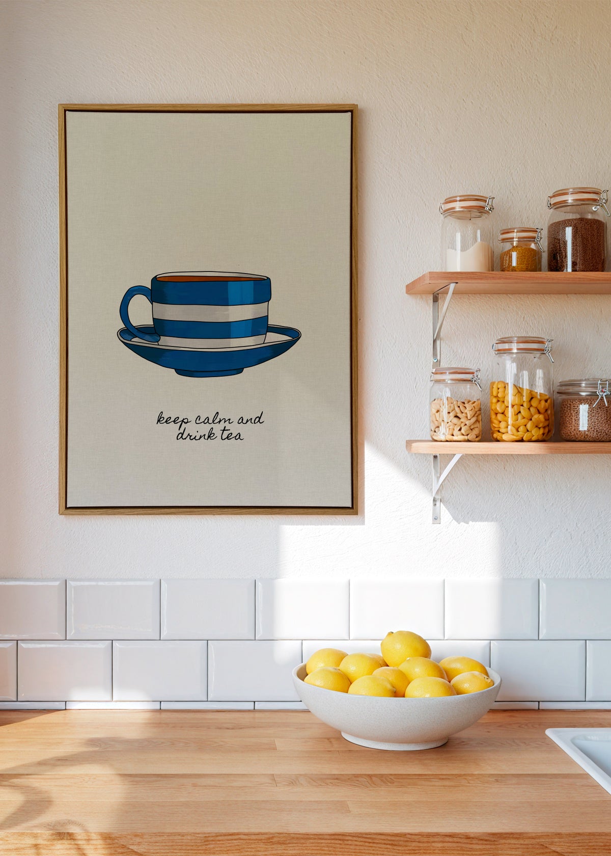 Keep Calm and Drink Tea - Framed canvas in an interior