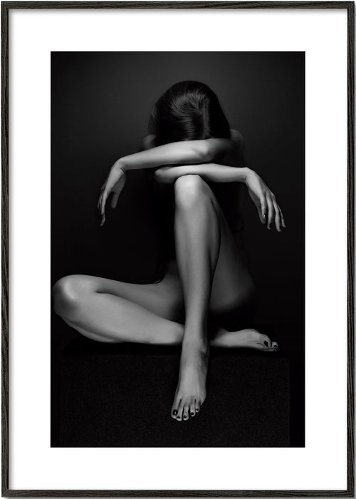 Fotografie van zittend figuur in studio