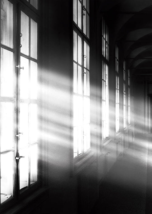Gangfotografie met ramen en lichtstralen