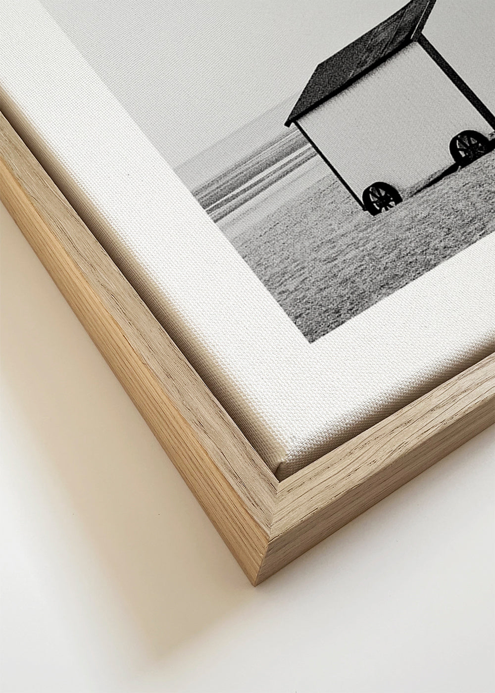 Landschapsprent zwart-wit met strandhuisjes