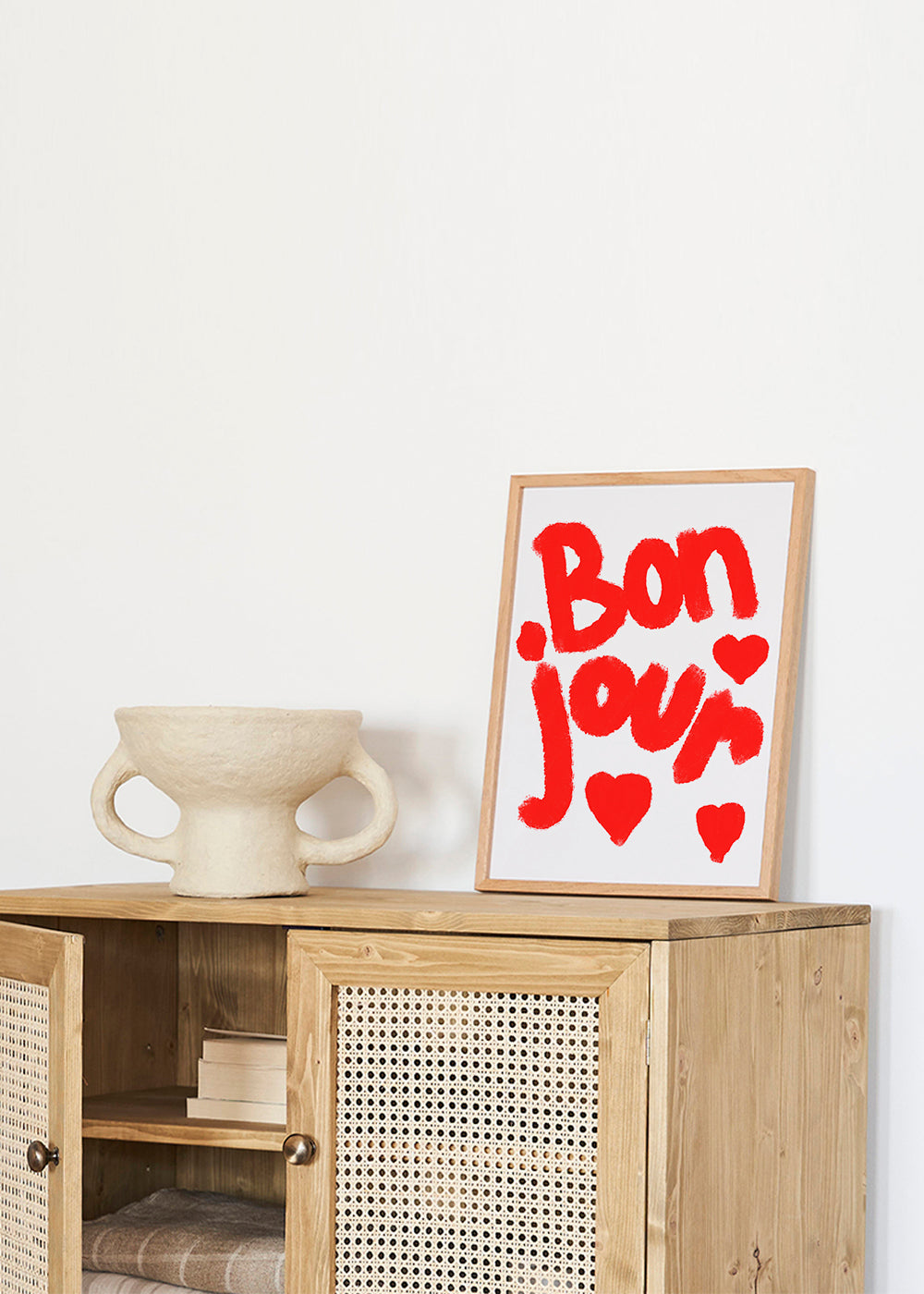 Illustratie 'Bonjour' met rode harten
