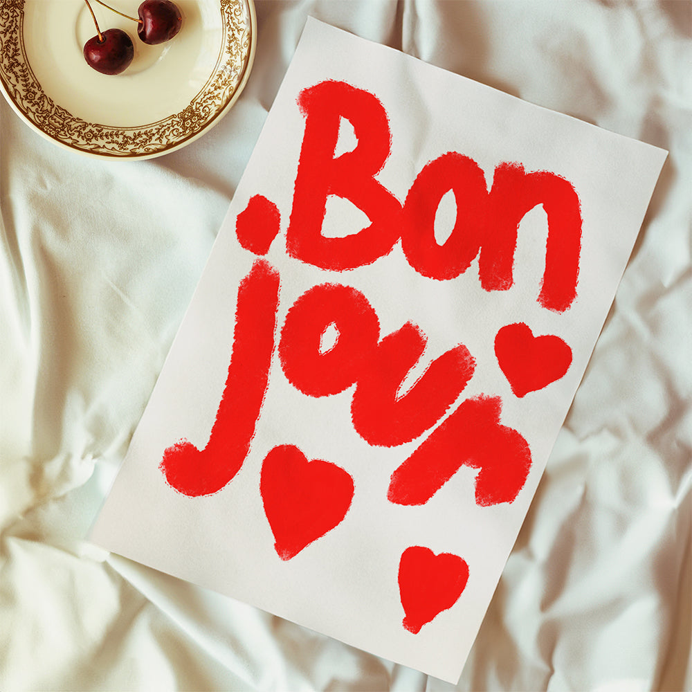 Illustratie 'Bonjour' met rode harten