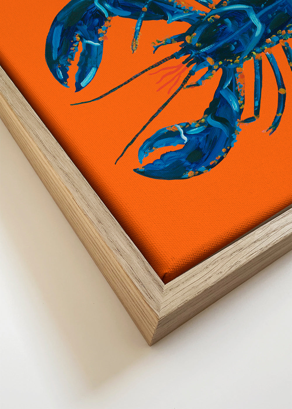 Keuken kunst: blauwe kreeft op oranje