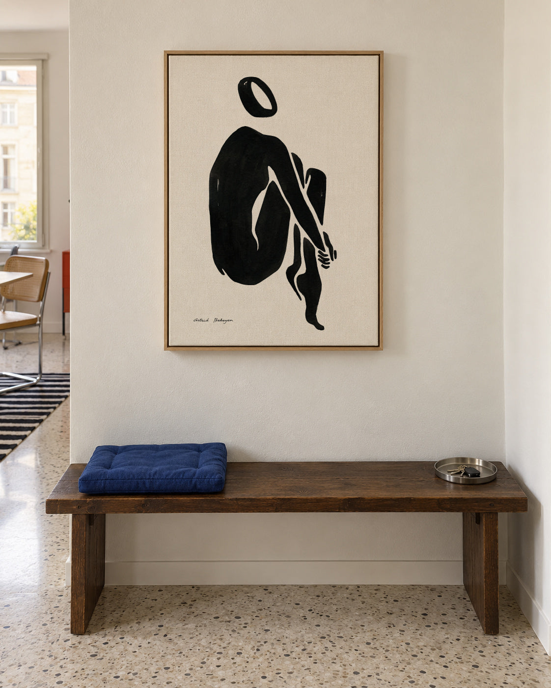Black figure #5 - Framed canvas in an interior