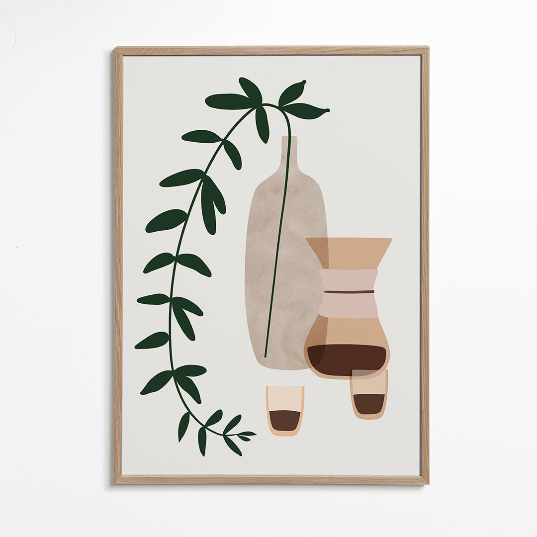 Keuken kunst met koffiekan en botanische tak