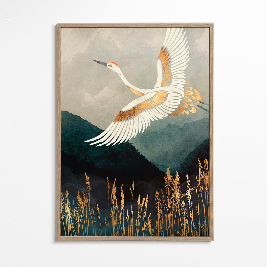 Gouden kraanvogel in vlucht