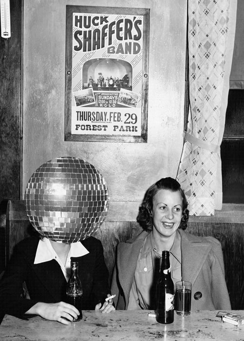 Vintagefoto van stel met discobal-hoofd