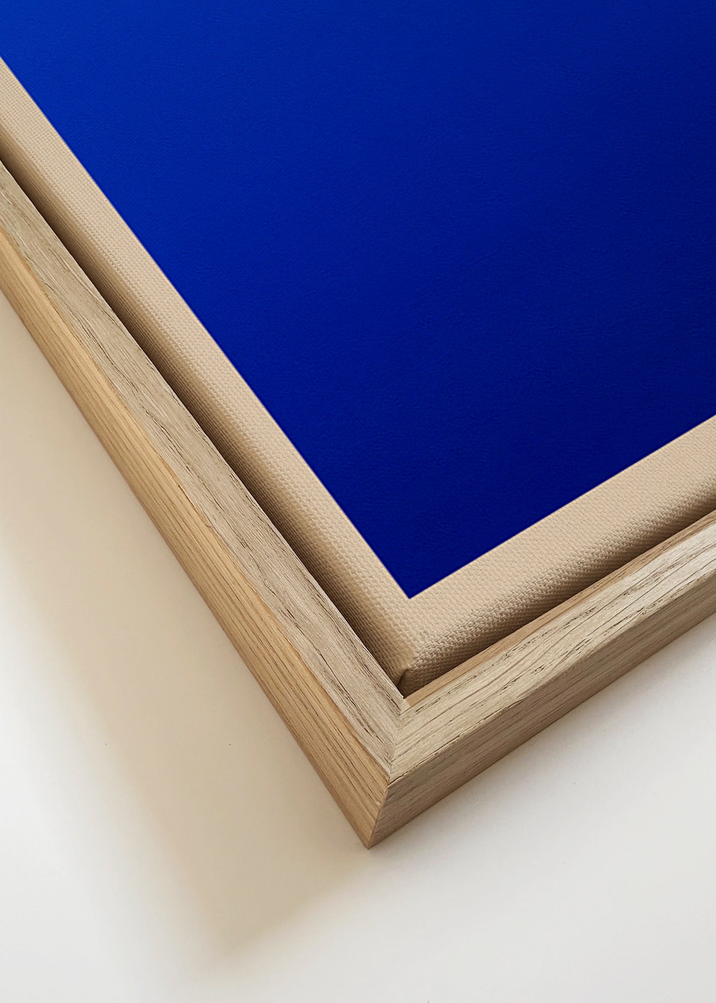 Abstract kunst blauw vlak met beige rand – Canvas detail