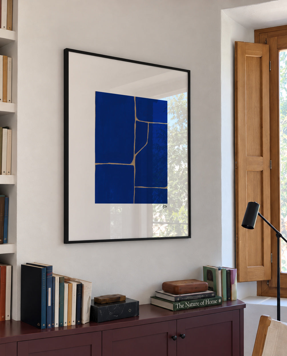 Blue Grid - Framed poster in an interior