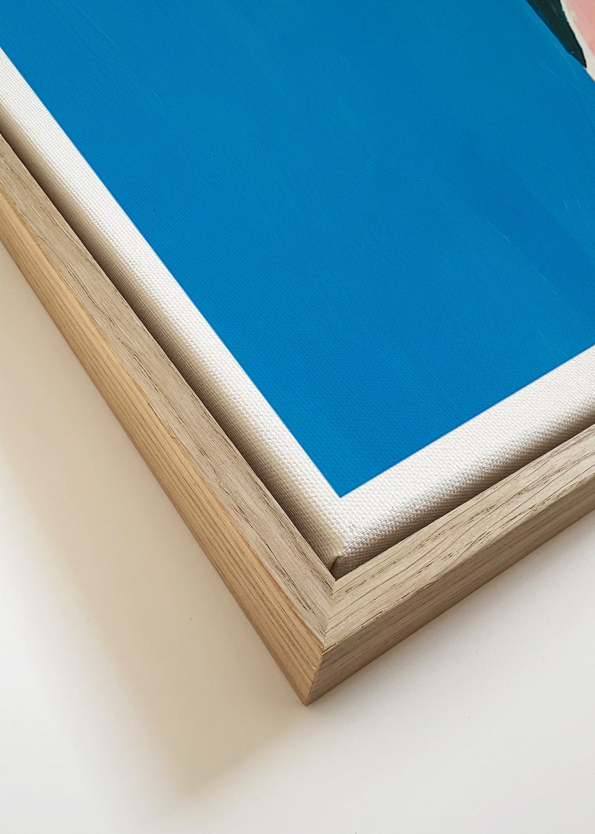 Abstract kunst: blauw vlak en roze curve – Canvas detail