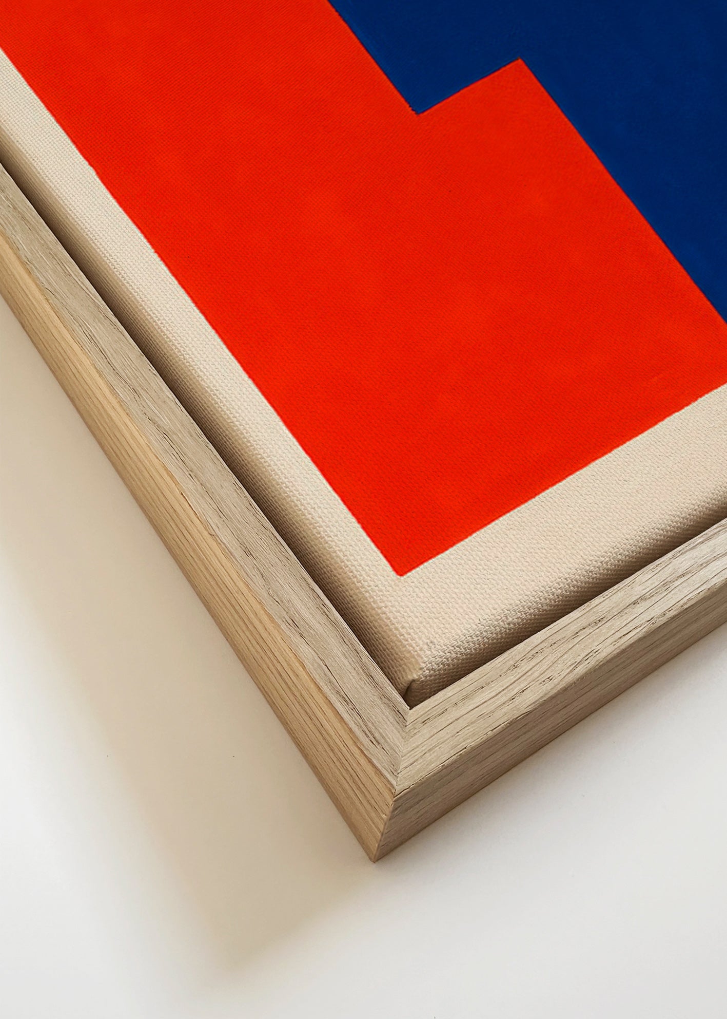 Abstract kunstwerk met rode en blauwe vlakken – Canvas detail