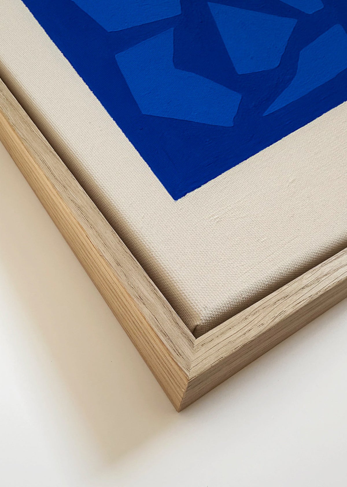 Abstract blauw kunstwerk met gefragmenteerde vormen – Canvas detail