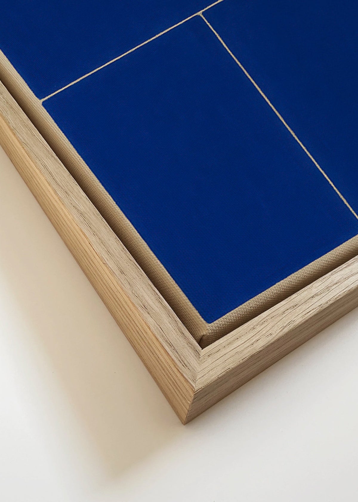 Geometrisch kunstwerk met blauwe vlakken – Canvas detail