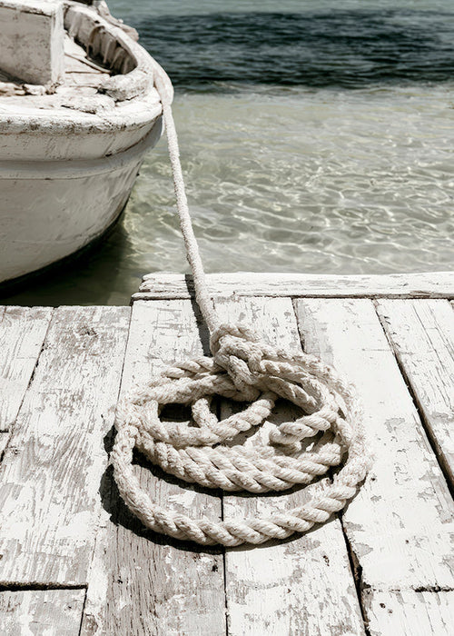 Photographie de ponton et corde au premier plan