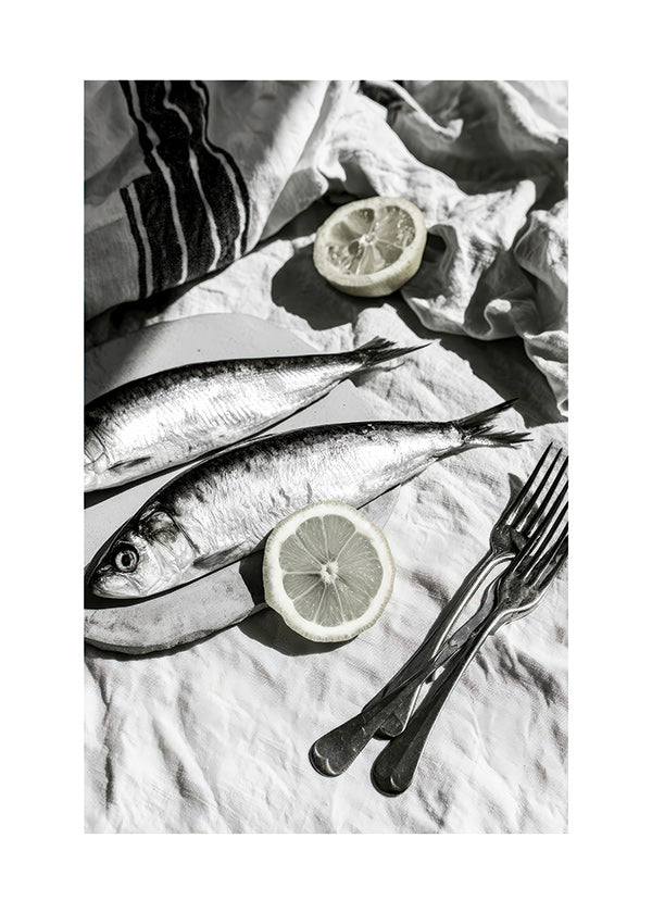 Keuken kunst: monochrome sardines en citroen stilleven