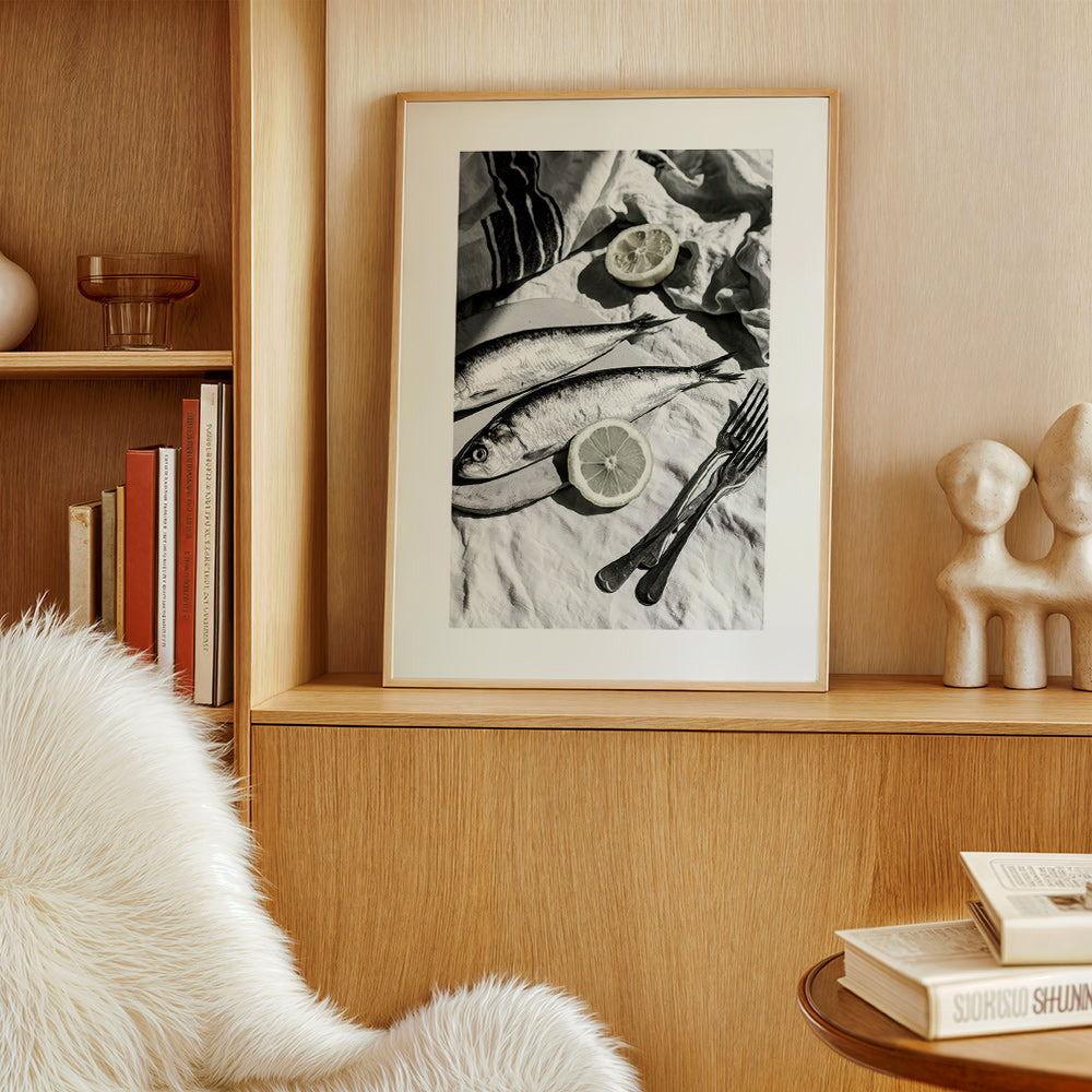 Keuken kunst: monochrome sardines en citroen stilleven